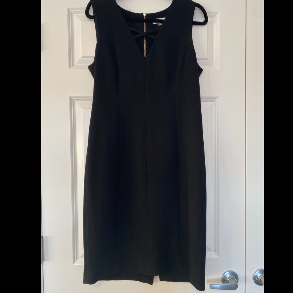 Black bodycon Calvin Klein dress with gold zipper; Size 12.
